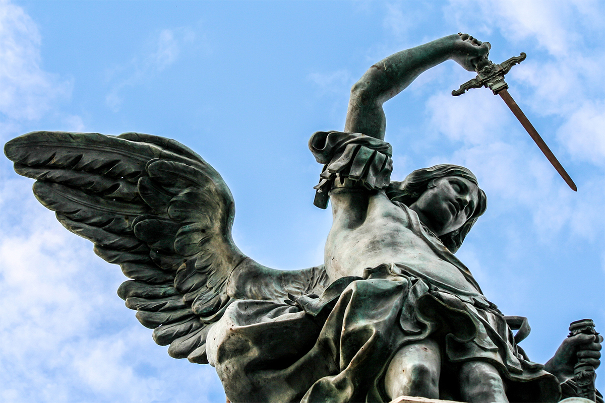 The statue of Archangel Michael, in the act of sheathing his sword