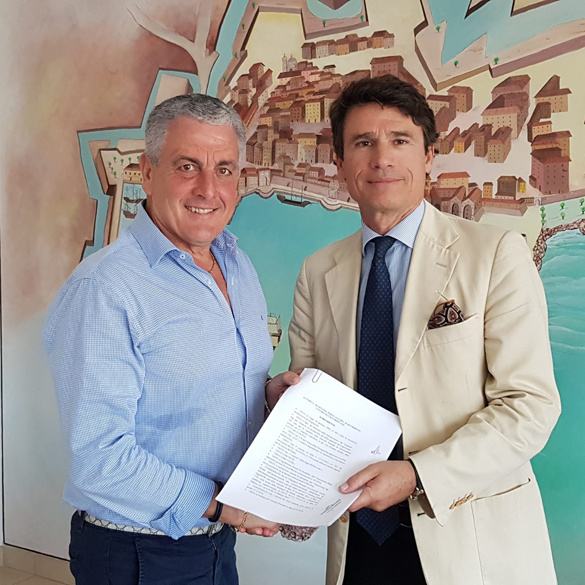 El presidente de la Compañía Portuaria de Civitavecchia Enrico Luciani y el presidente de la AdSP Francesco Maria di Majo