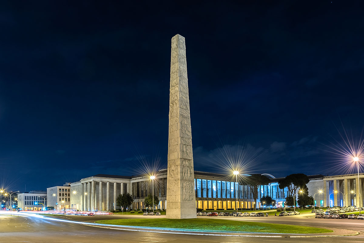 The obelisk in Piazza Marconi at night