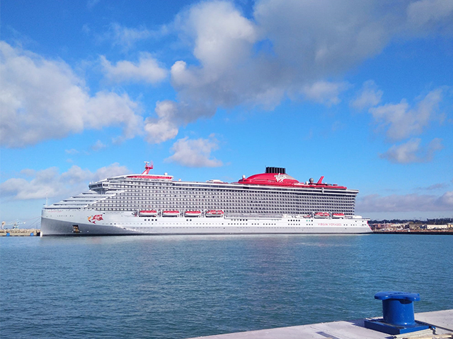 The sister ship Scarlet Lady at the port of Civitavecchia.