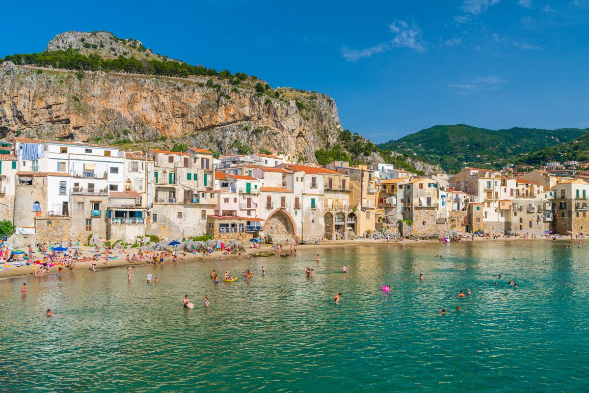 Famous Cefalu beach, nestled between the houses